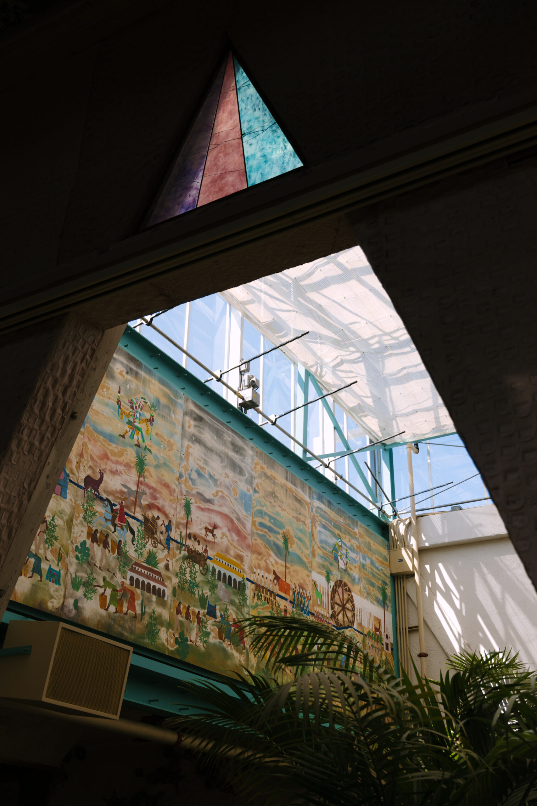 closeup of the skylight, mural, and stained glass in foyer of the Grass Room DTLA