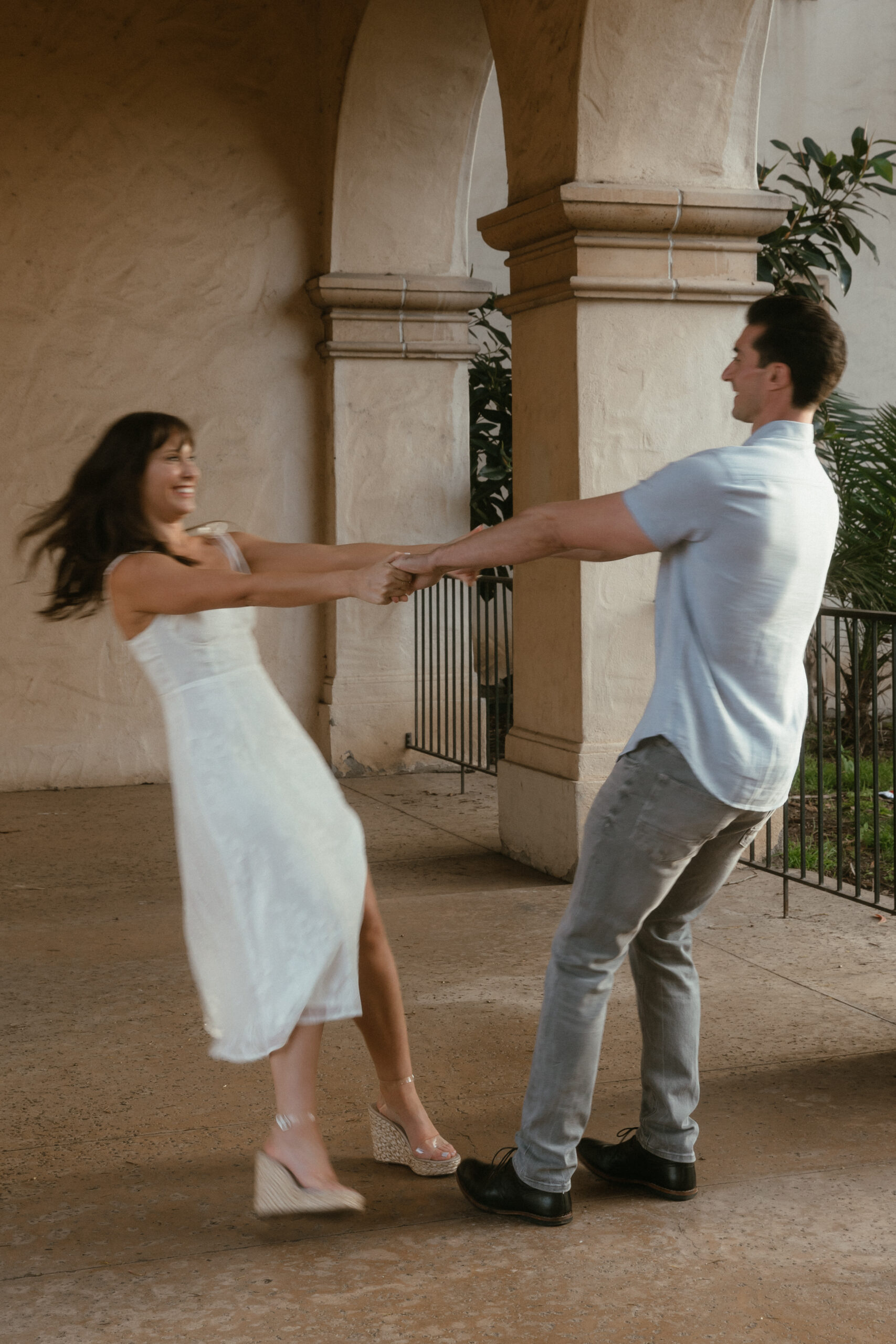 blurry photo of couple dancing together at Casa del Prado in Balboa Park