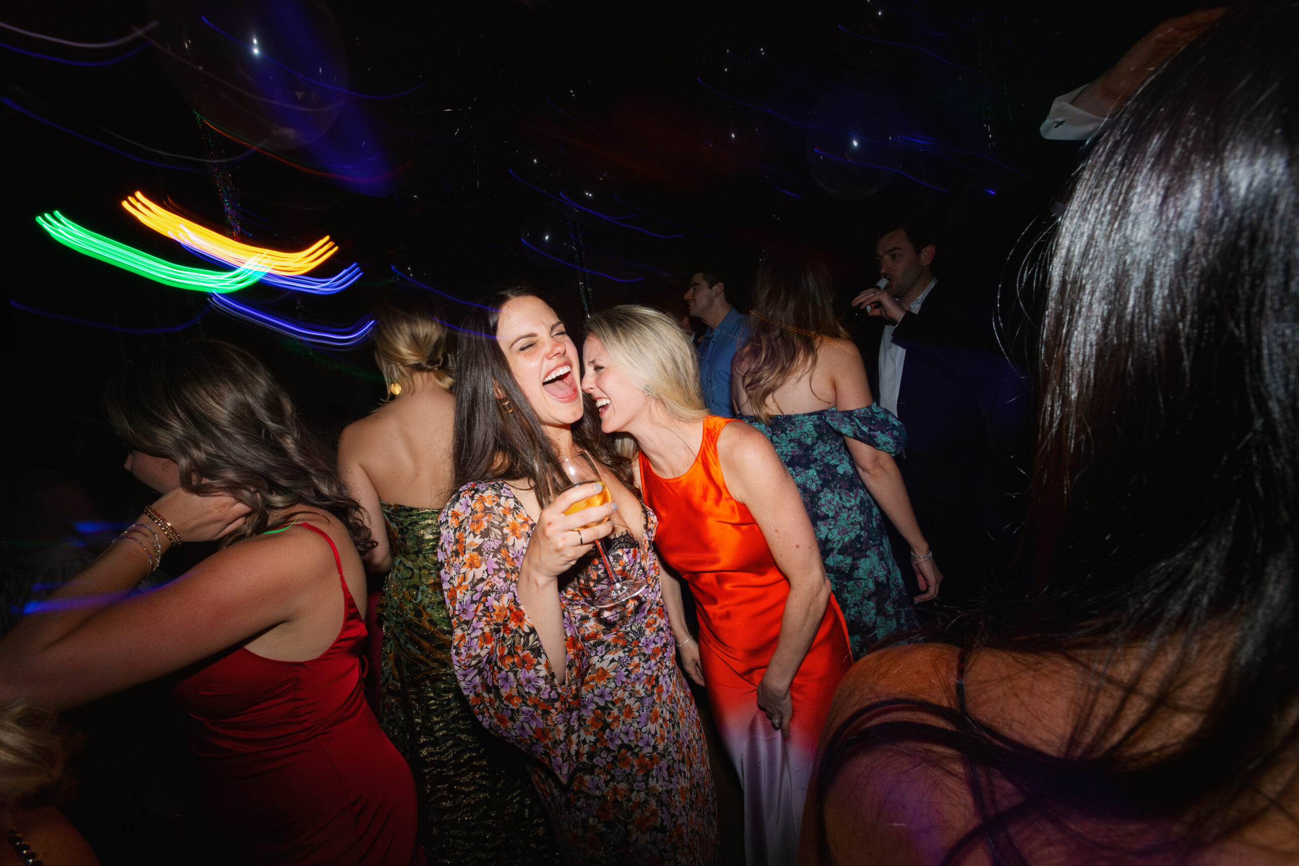 flash photo of guest laughing on dance floor at Parker Palm Springs wedding